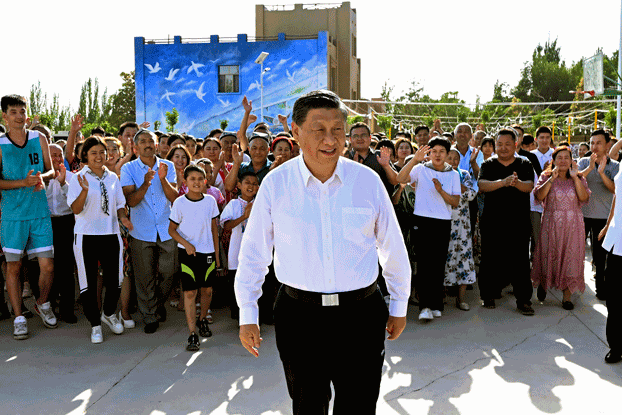 Chinese President Xi Jinping (C) inspects a local village in Turpan, northwestern China's Xinjiang Uyghur Autonomous Region, July 14, 2022. Credit: Xinhua News Agency