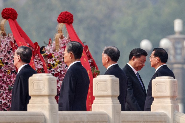 China's top leadership pays respects to heroes of revolution amid citywide clampdown