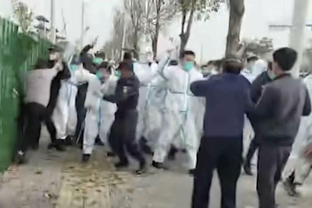 Workers clash with police as hundreds protest at iPhone plant in China