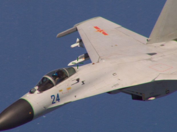 Chinese fighter jet and US military plane nearly collide