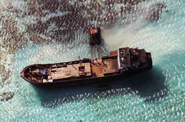 China denies report it is developing reefs and cays in the South China Sea