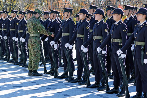 Japanese Ground Self-Defense Force honor guard troops prepare for a review at Camp Asaka in Tokyo, Nov. 27, 2021. Credit: Associated Press
