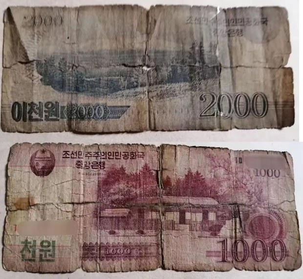 North Korea confiscates dollars and yuan after declaring foreign currency illegal