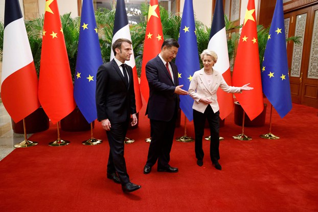 China's President Xi Jinping (C), his French counterpart Emmanuel Macron (L), and European Commission President Ursula von der Leyen (R) meet for a working session in Beijing, April 6, 2023. Credit: Pool via Associated Press