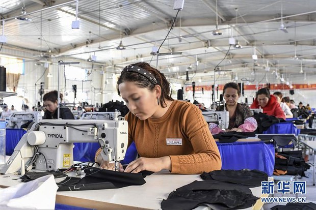 Facing abuse, teenage Uyhgur girls are forced to work in a Xinjiang garment factory