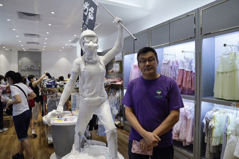 Herbert Chow, who owned the now-shuttered children's clothing chain Chickeeduck, said his "yellow" credentials had massively boosted interest in his high-end products. Credit: Kin Cheung/AP file photo