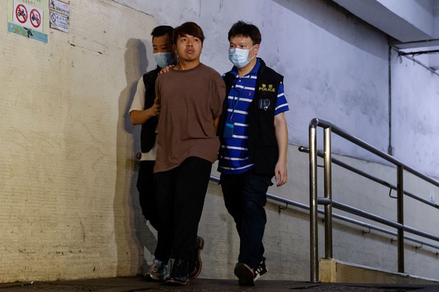 Hong Kong police arrest five for helping exiled activists