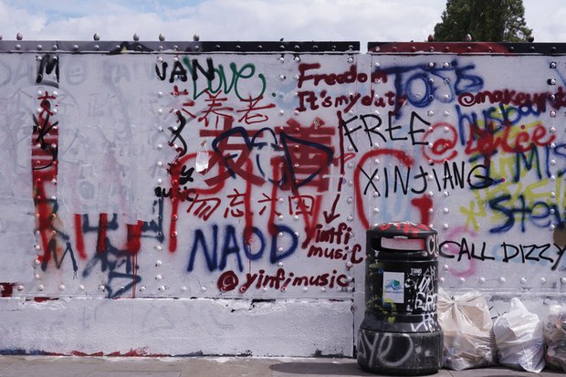 Chinese Communist Party slogans spark graffiti war on London's Brick Lane