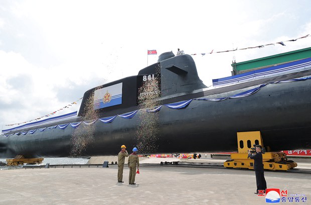 North Korea warns of underwater nuke attack as new submarine unveiled