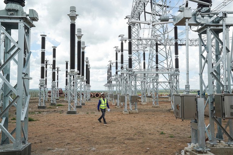 A worker patrols the construction site of the Konza transformer substation in Machakos County, Kenya, May 5, 2023. The substation, located about 70 km (43 miles) southeast of the Kenyan capital Nairobi, is part of the Kenya Power Transmission Expansion Project, a project under China’s Belt and Road Initiative. Credit: Han Xu/Xinhua via Getty Images