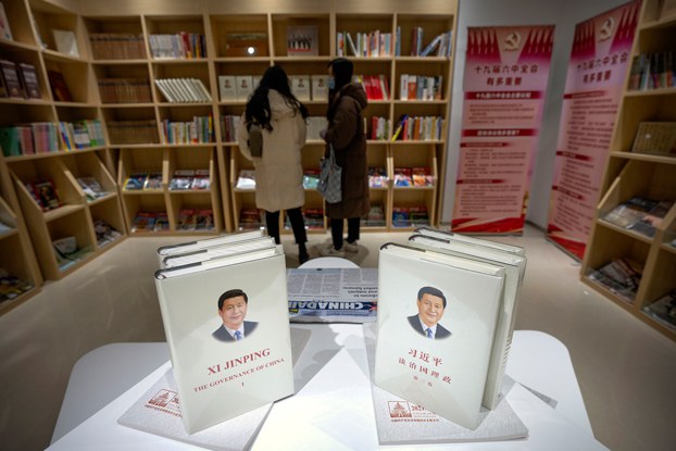 Copies of 'The Governance of China' by Chinese President Xi Jinping are displayed in a Beijing bookstore, Dec. 24, 2021. Credit: Mark Schiefelbein/AP
