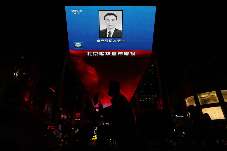 A giant screen displays a live news broadcast of an obituary for the late Chinese Premier Li Keqiang in Beijing, Oct. 2023. The mysterious death of former Chinese premier Li Keqiang a couple of weeks ago came as a shock to many. As the massive spontaneous mourning activities grabbed international attention, there was relative silence within party ranks. Credit: Florence Lo/Reuters