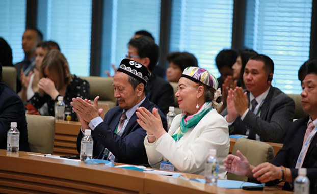 Attendees applaud at the International Uyghur Forum in Tokyo held on Oct. 30-31. Credit: Bahram Sintash/RFA