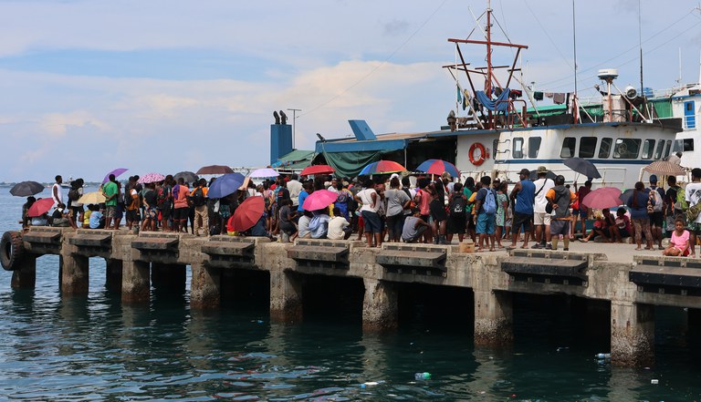 People wait to board a passenger ferry at the port in Honiara, Solomon Islands, April 11, 2024. [Stephen Wright/BenarNews]
