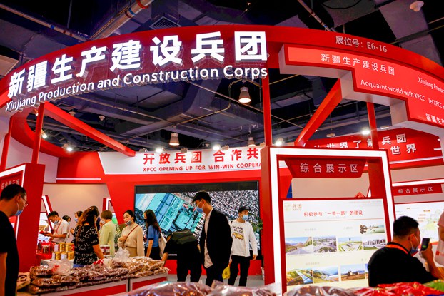People visit the Xinjiang Production and Construction Corps booth during the 2021 China International Fair for Trade in Services, or CIFTIS, in Beijing, Sept. 4, 2021. (Florence Lo/Reuters)