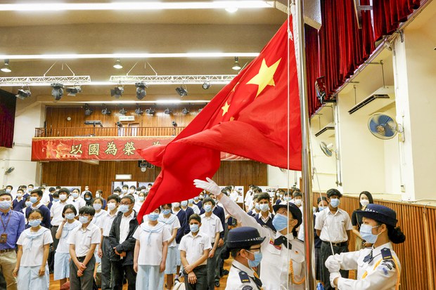 Attend flag ceremony or miss key math exam, Hong Kong student told