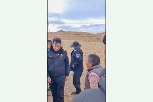 Chinese police argue with Tibetans protesting the seizure of pasture land in Markham county in western China's Tibet Autonomous Region, April 10, 2024. (Citizen journalist/video screenshot)