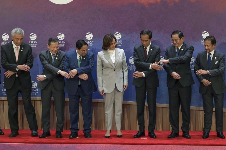 U.S. Vice President Kamala Harris watches as leaders of ASEAN prepare to pose for a group photo during the ASEAN-U.S. Summit in Jakarta, Indonesia, Sept. 6, 2023. (Bay Ismoyo/Pool via AP)